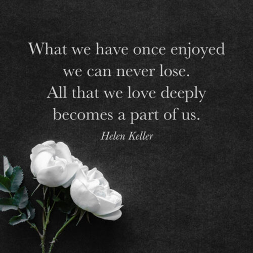 Quote about loss by Helen Keller. On image with white flowers.